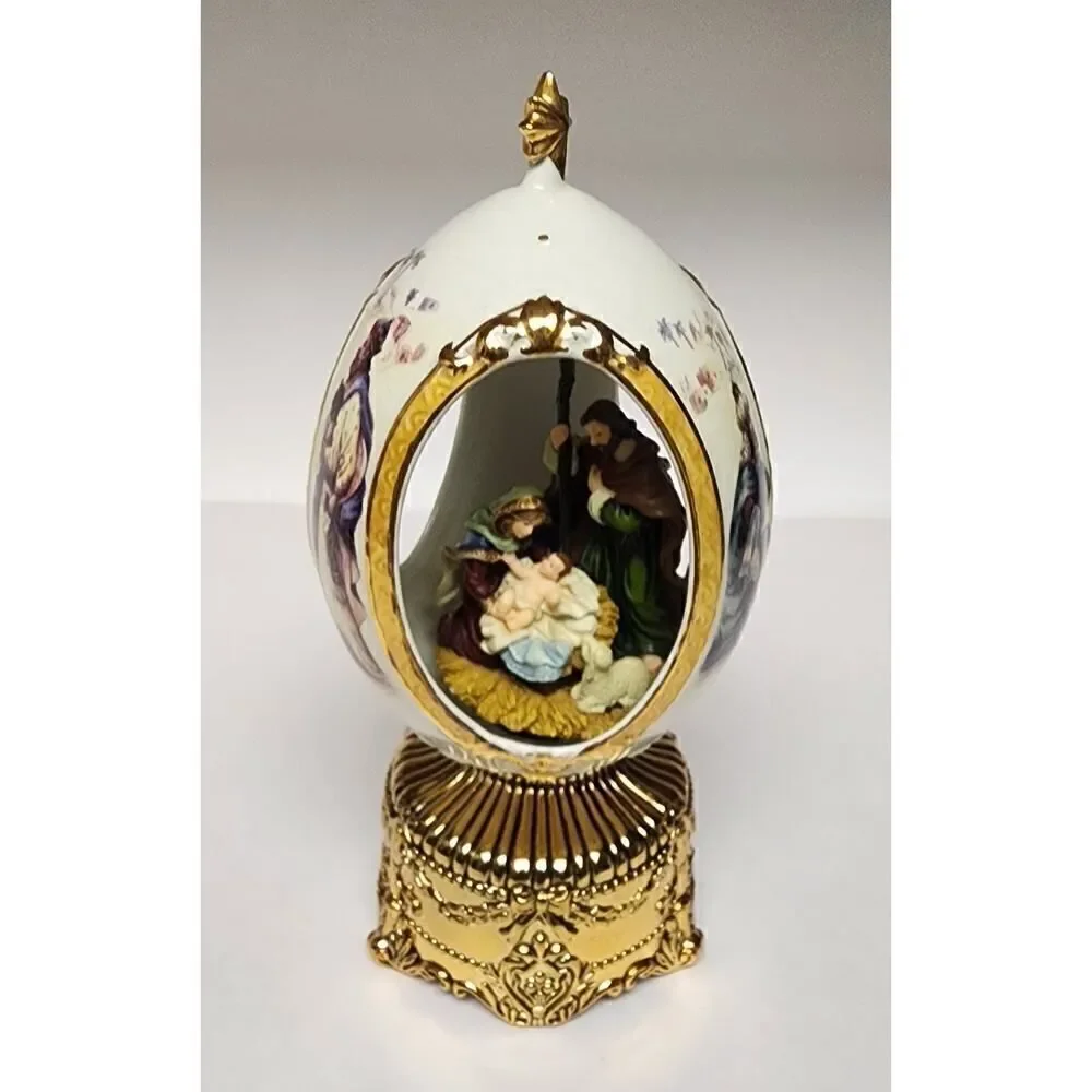 Home For The Holiday Porcelain Egg-Shaped Musical Box Revolving Nativity/Santa